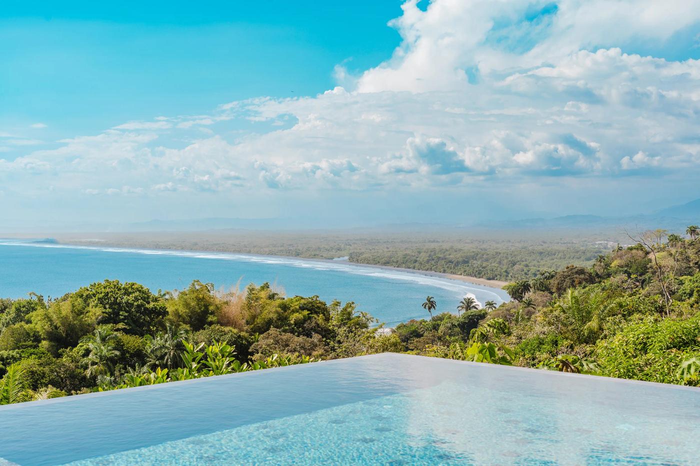 Infinity pool edge at Casa Nola dropping to the beach and the Pacific