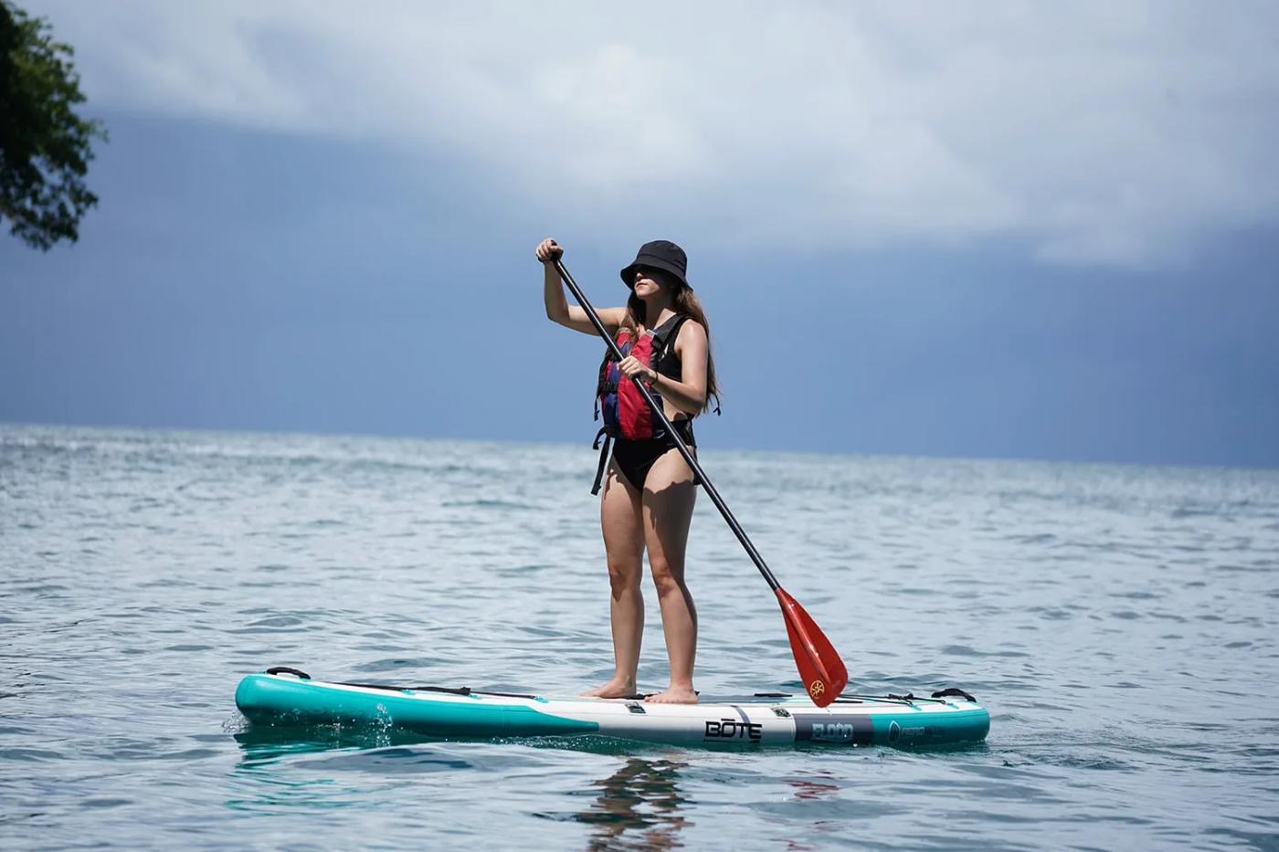 Paddleboarder on open water off Manuel Antonio