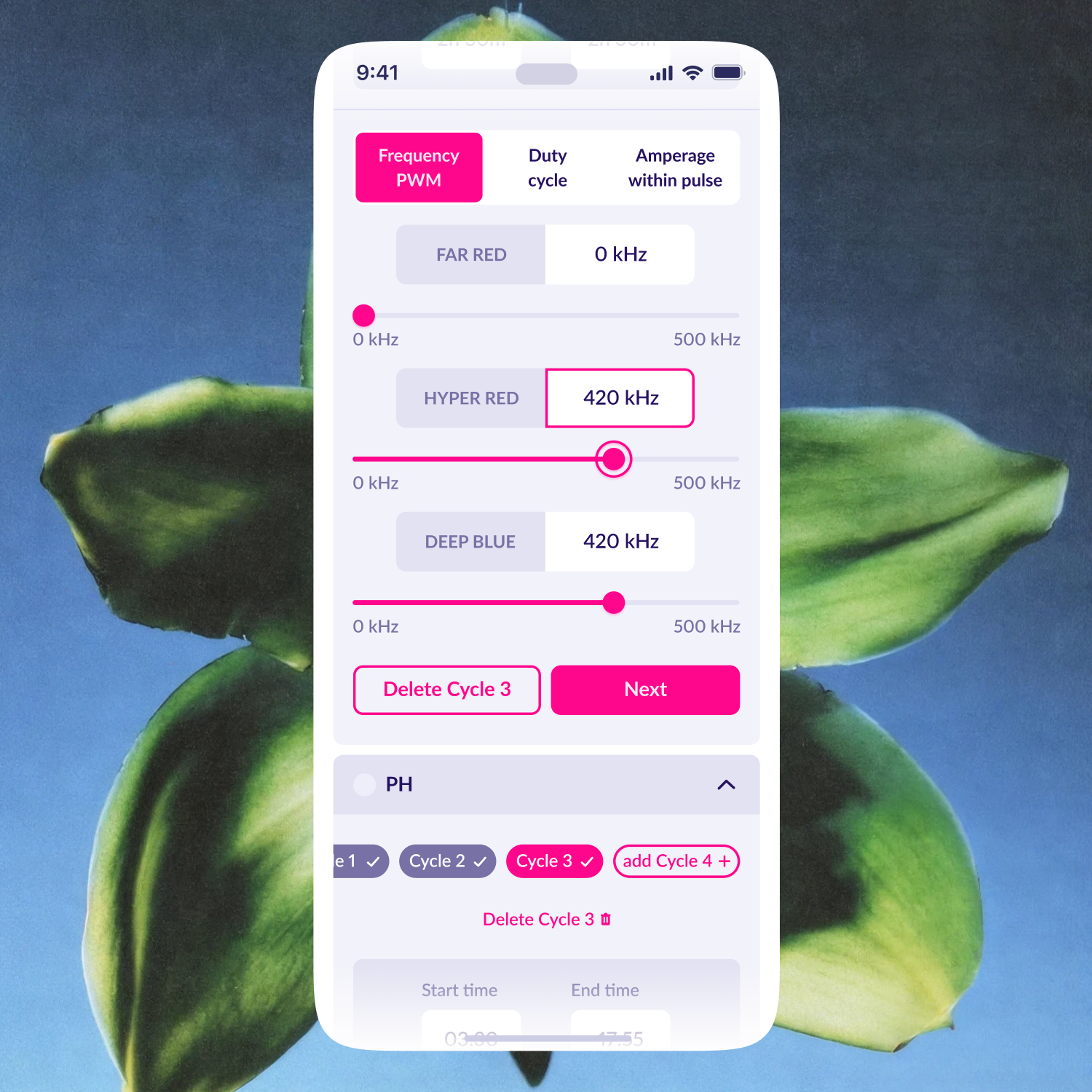 Frequency and cycle settings on a phone against a leaf