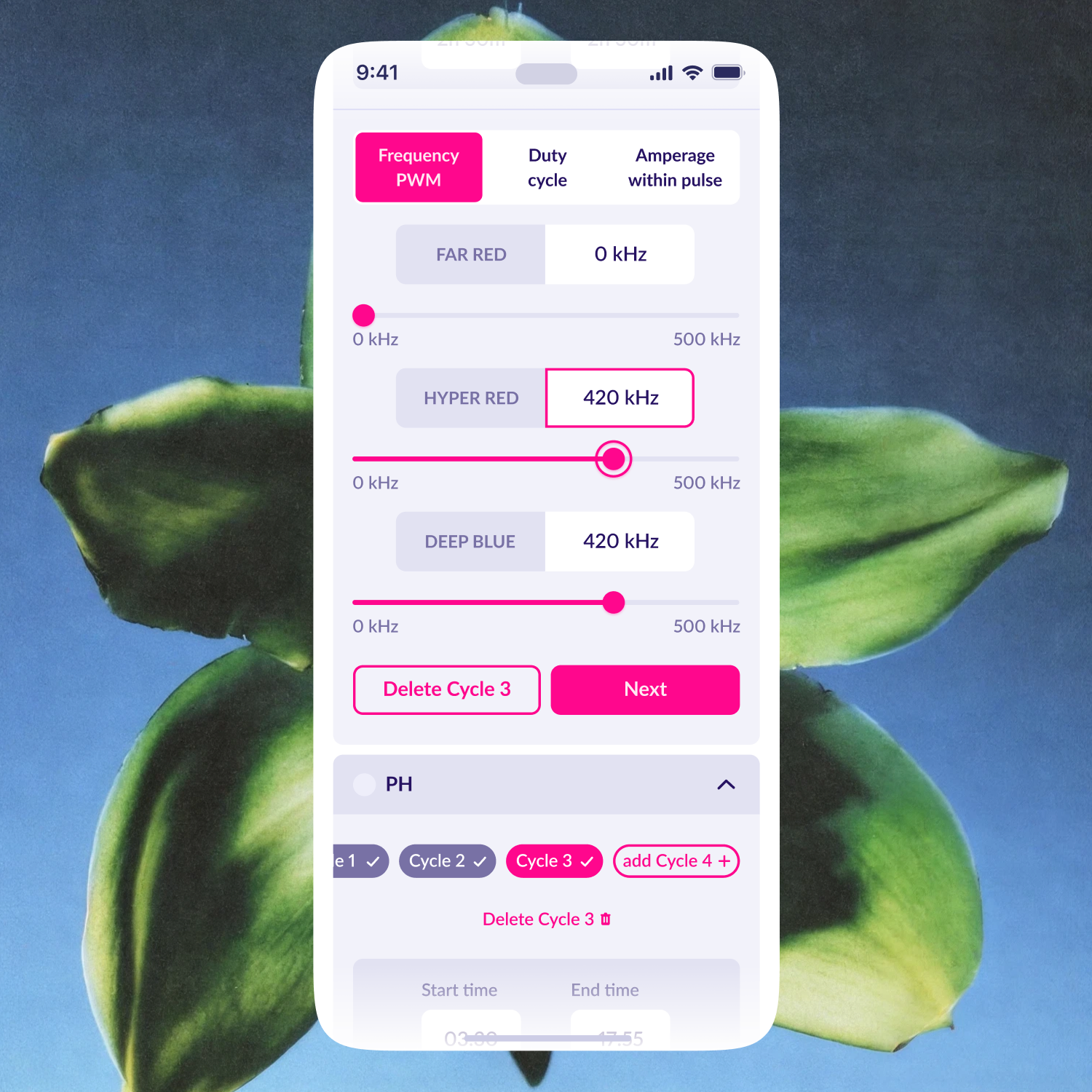 Frequency and cycle settings on a phone against a leaf