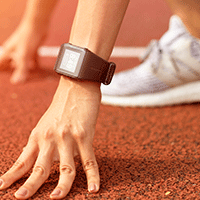 Wearable device on a track runner's wrist