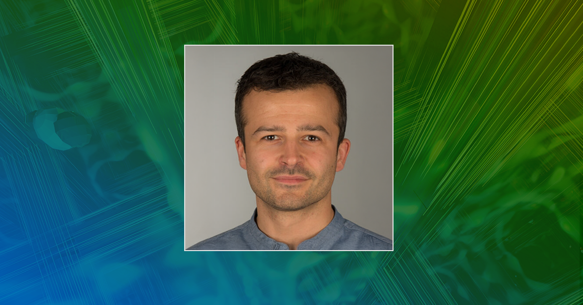 A headshot of Prof. Carlo Antonini on a blue and green background with abstract scientific and technical graphics.