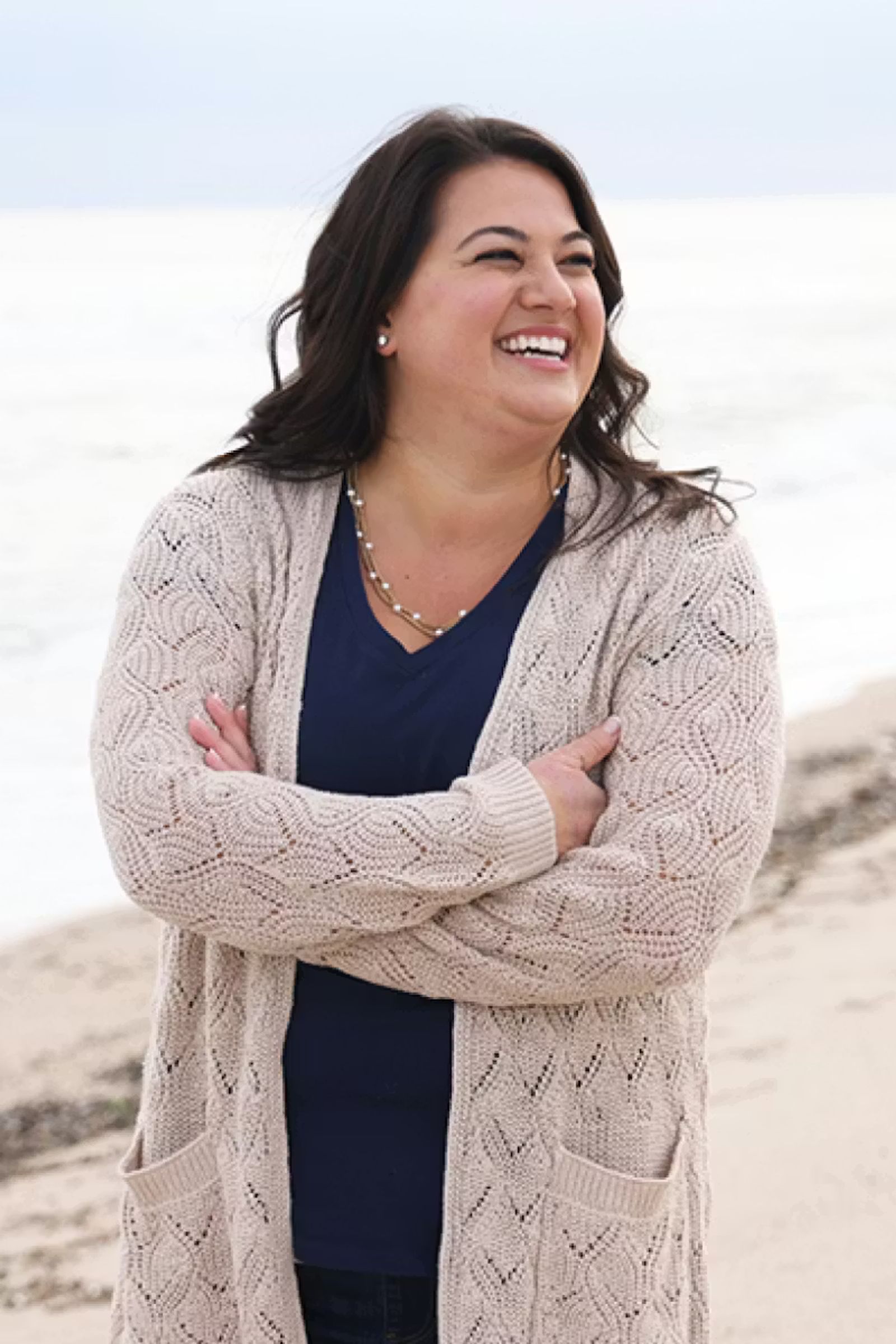 Smiling woman outdoors looking to the side