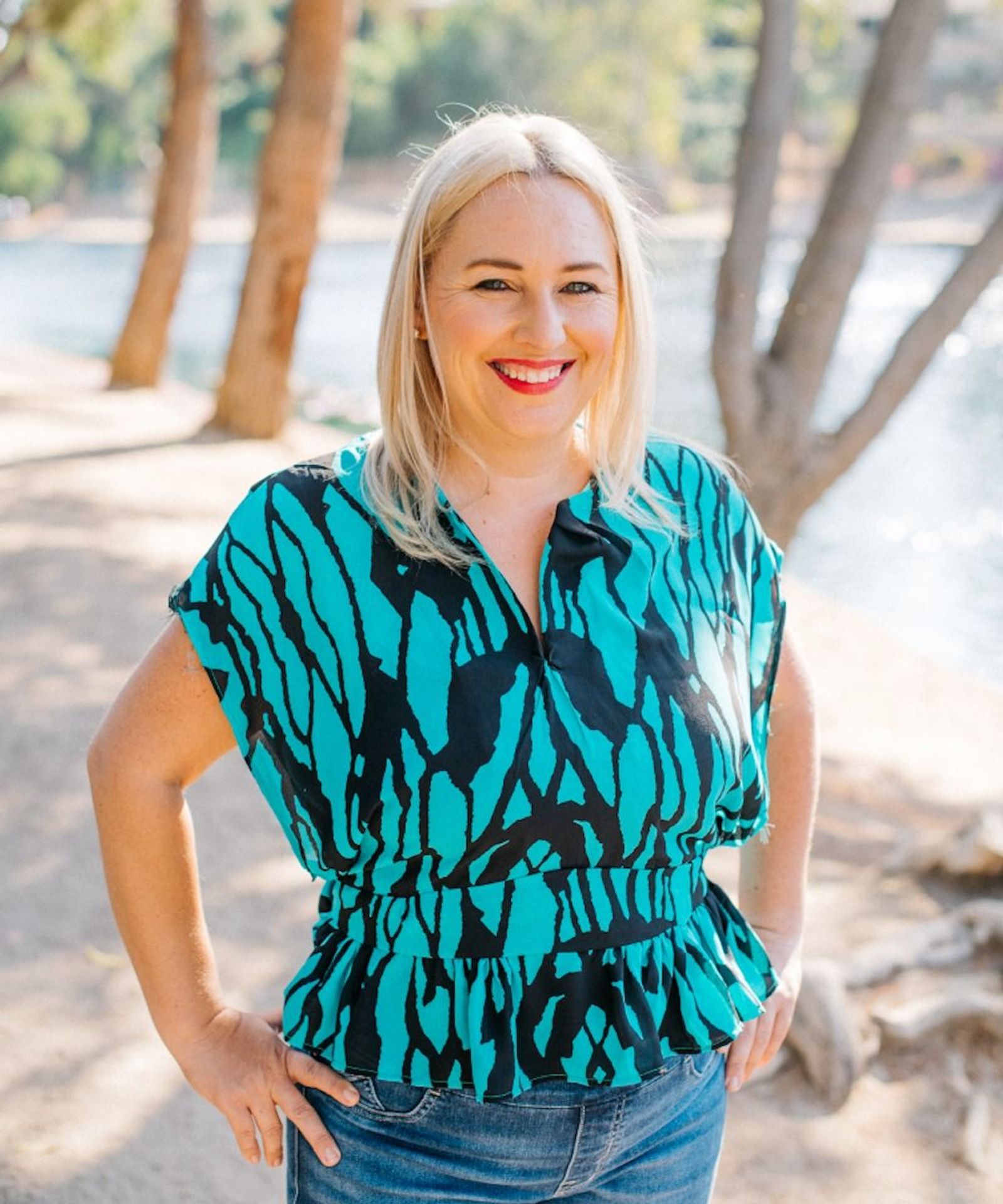 Smiling female member outdoors