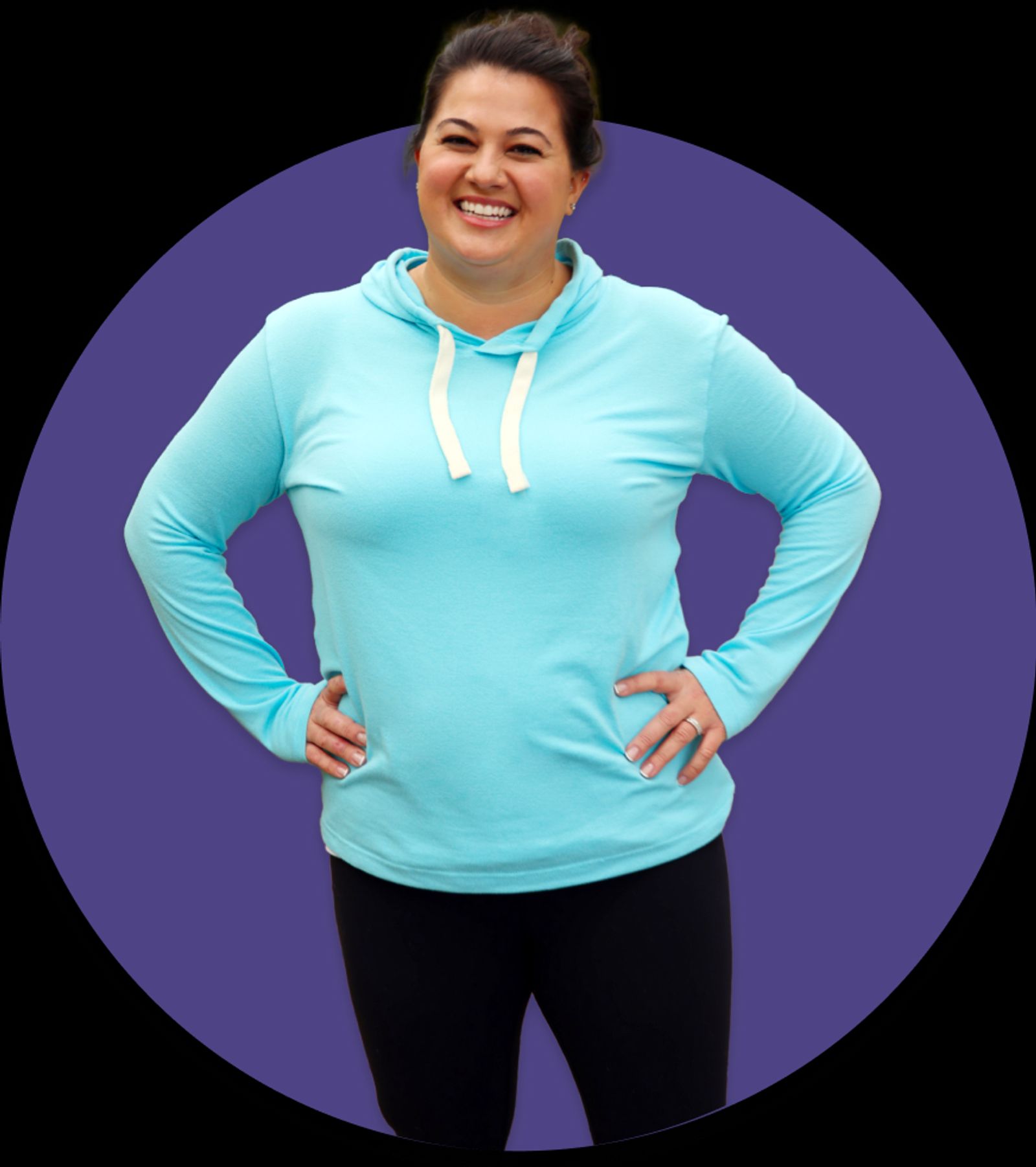 Woman standing confidently, representing successful weight loss results