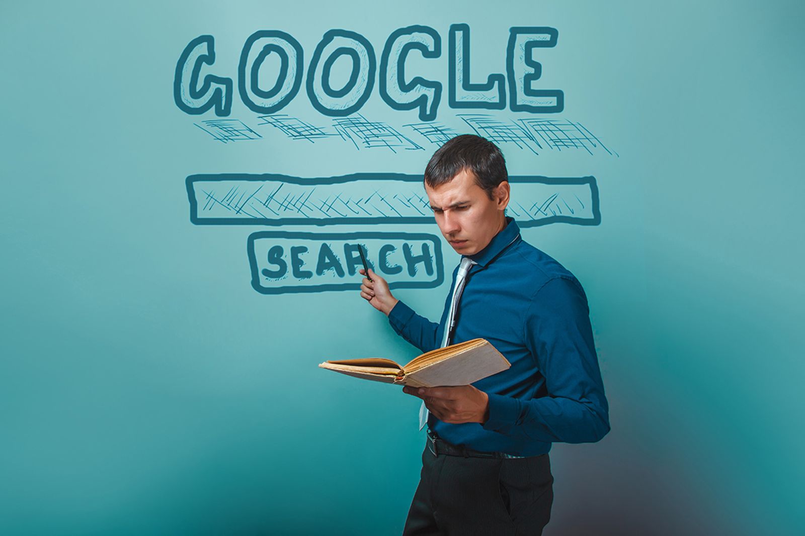 Man studying a book beside a chalk-drawn Google search bar on a teal wall
