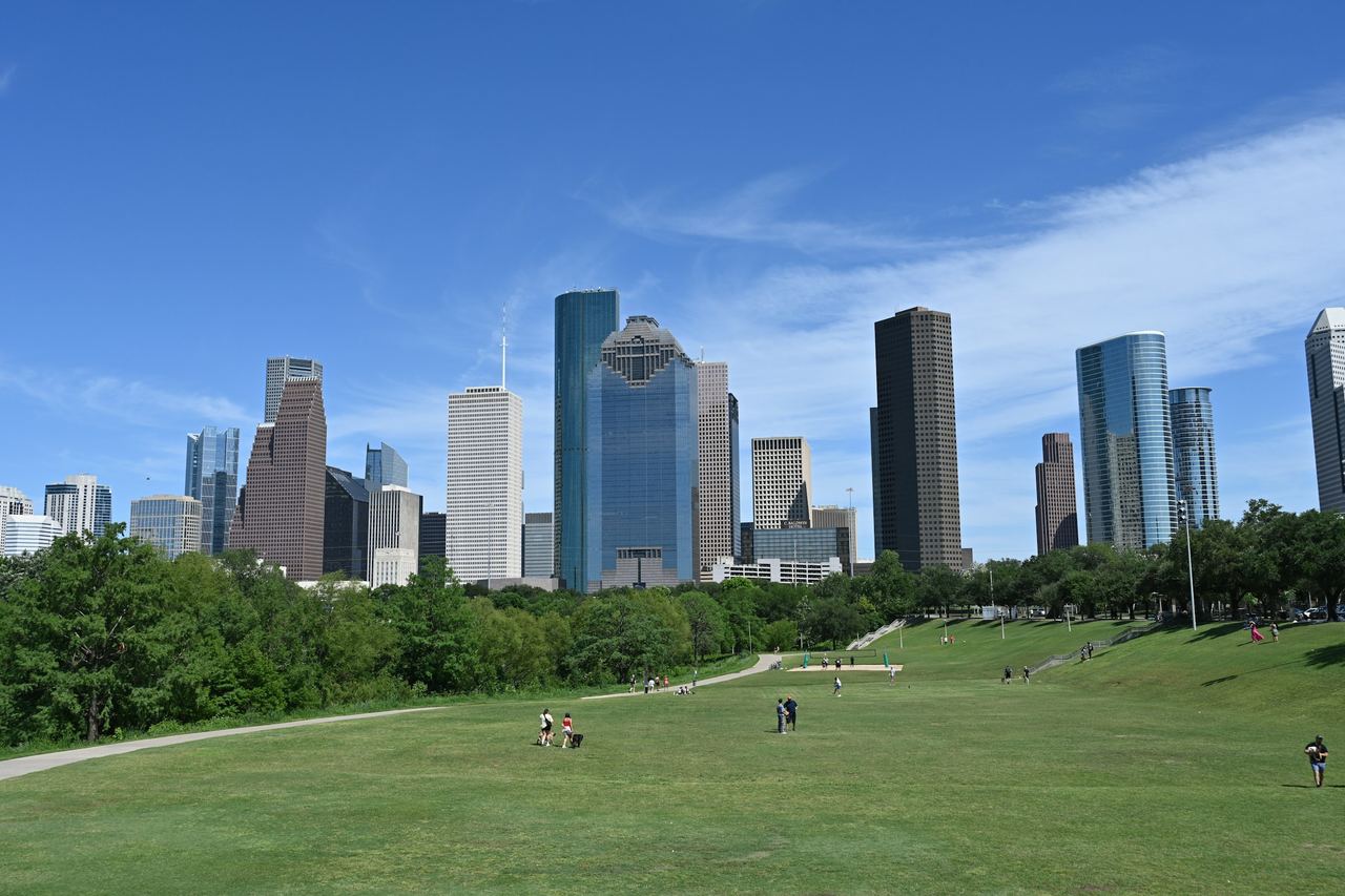 Houston, texas skyline is visible on a sunny day