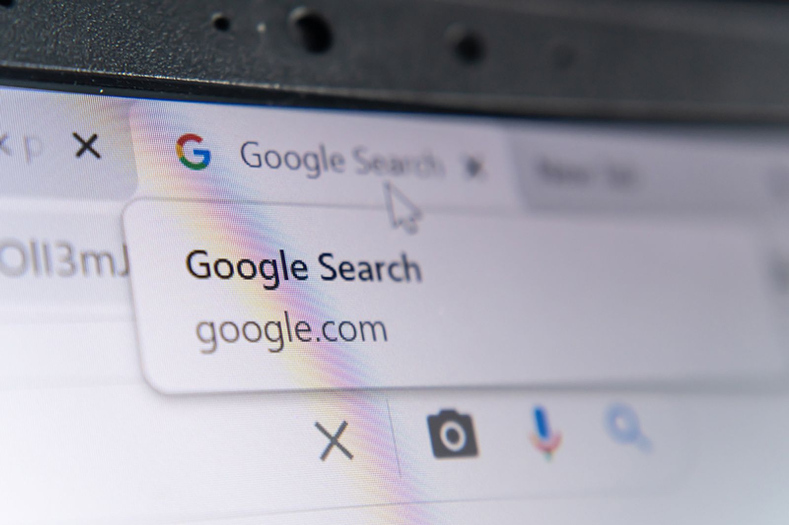 Close-up of a screen showing the Google Search suggestion in a browser address bar