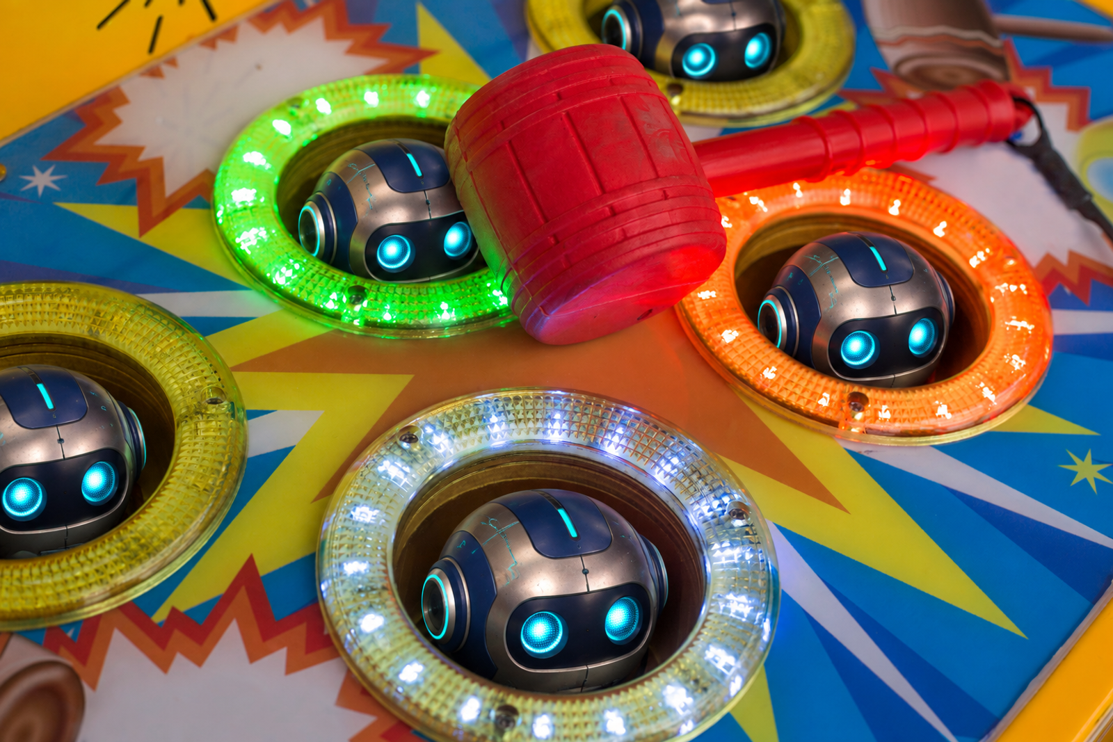 Small AI robots appearing in a colorful arcade-style whack-a-mole game