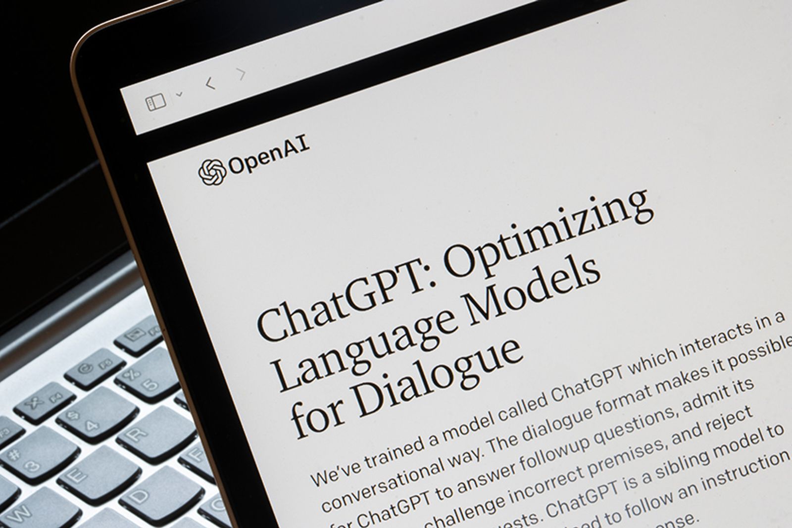 Tablet screen showing the OpenAI ChatGPT language model announcement page