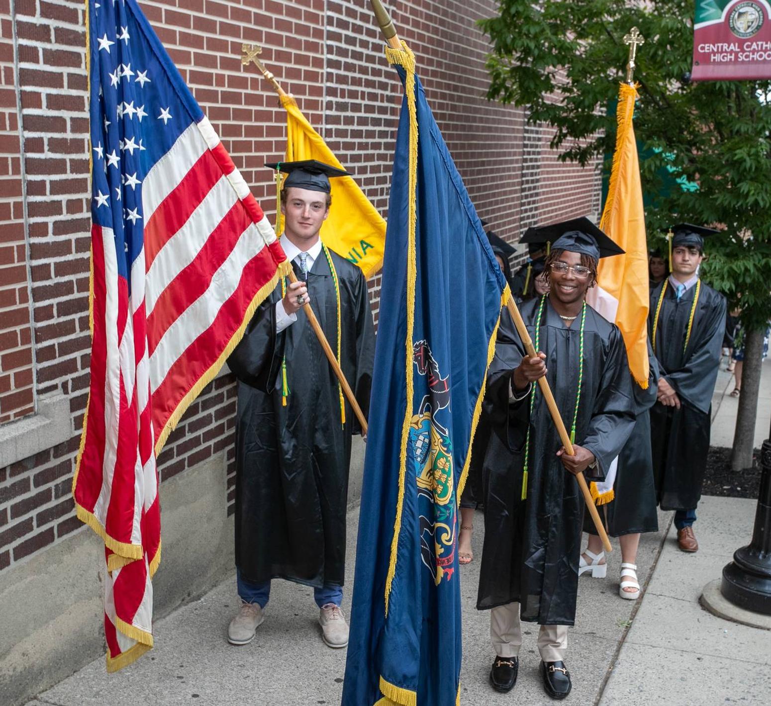 Notre Dame High School students with flags