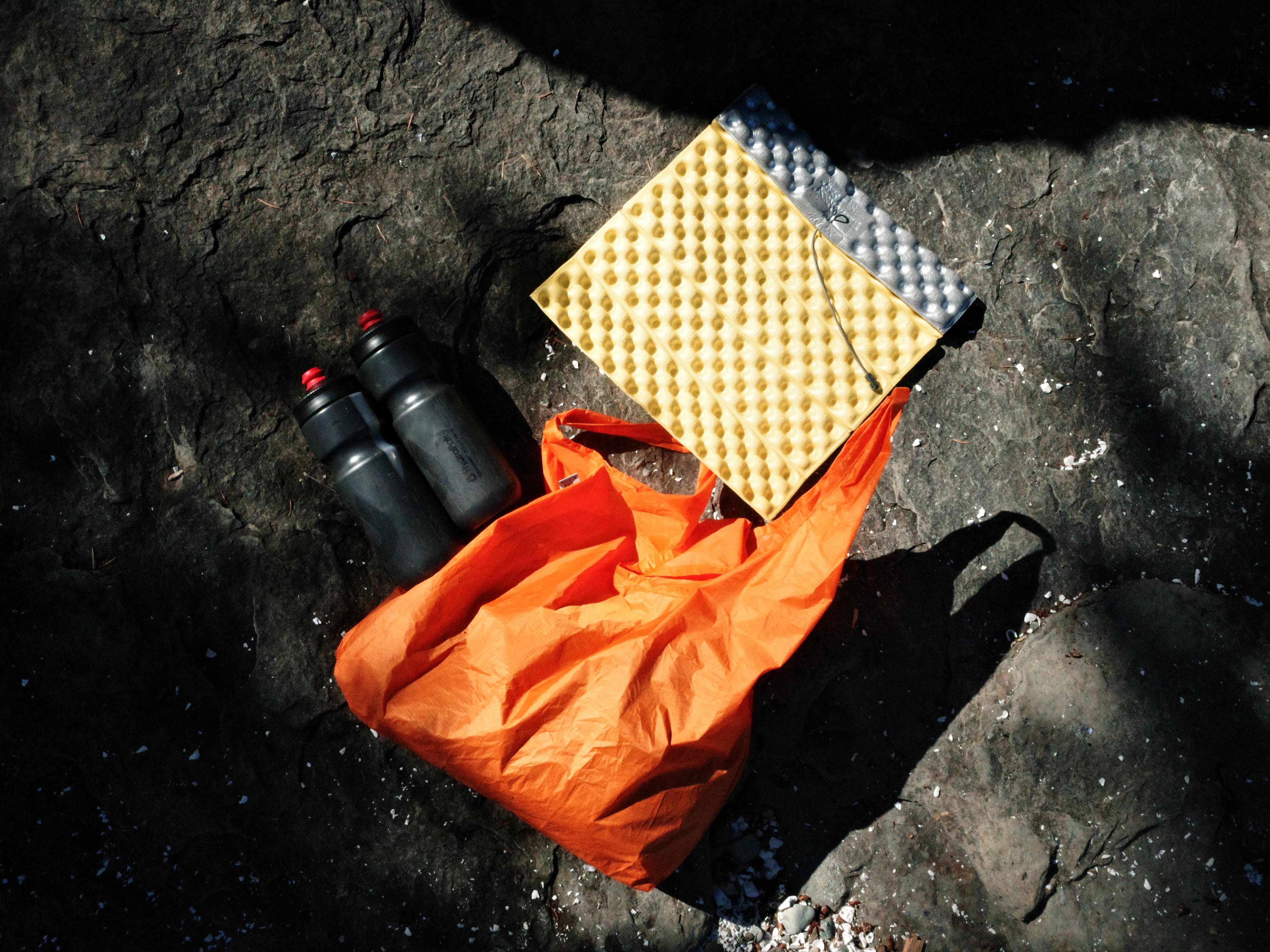 Water bottles on rocks
