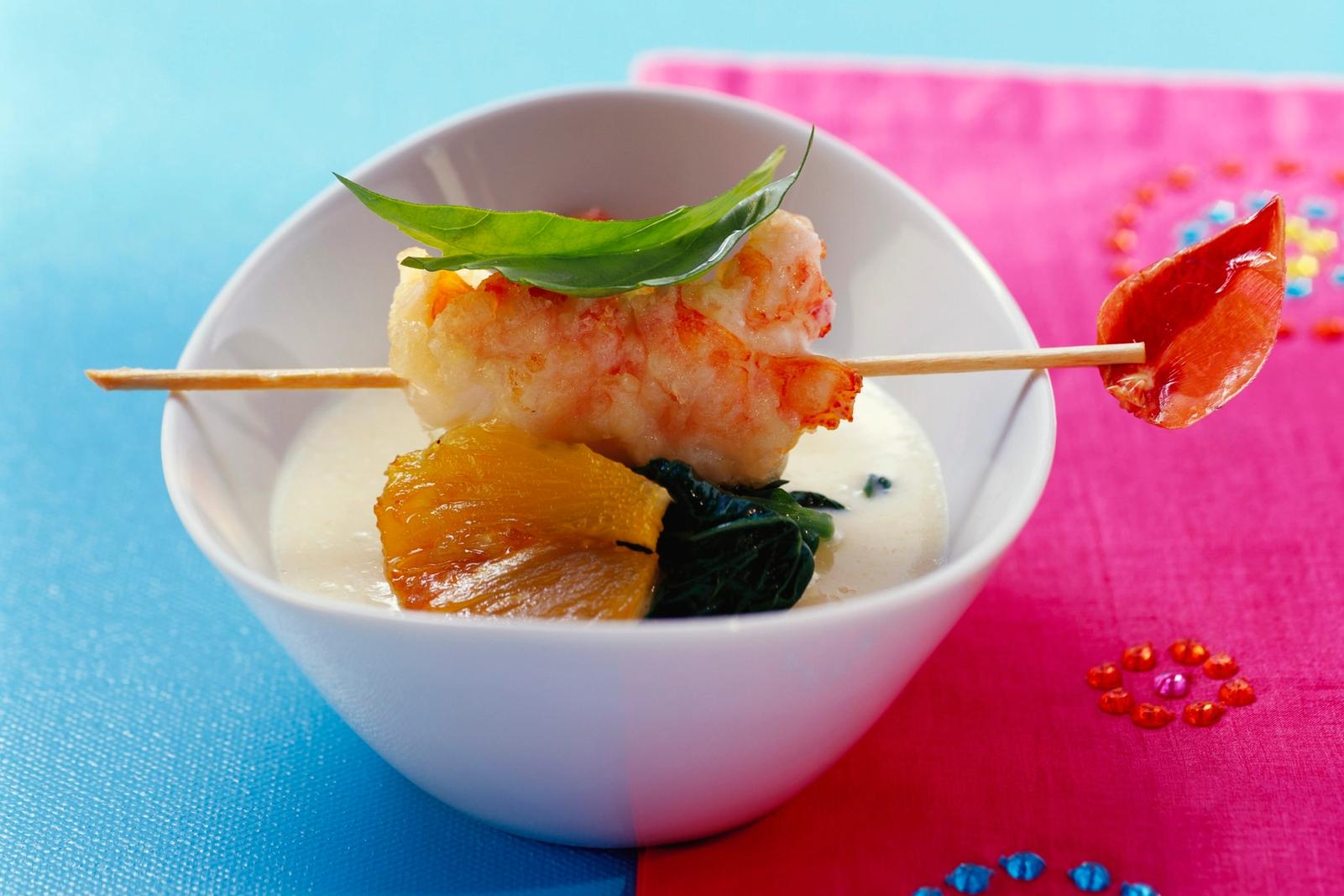 Langoustines en tempura d'amandes sur soupe de polenta