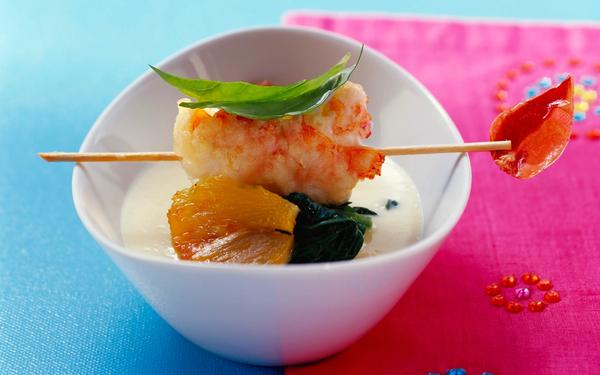 Langoustines en tempura d'amandes sur soupe de polenta