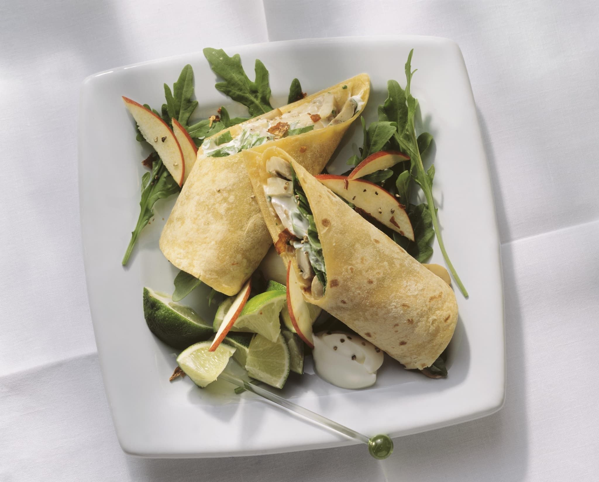 Tortillas roulées aux champignons, roquette et pommes croquantes