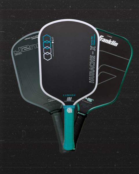 Three pickleball paddles overlapping on a dark background: a Honolulu J2, an 11SIX24 Hurache-X with a teal grip, and a black Franklin 16mm.