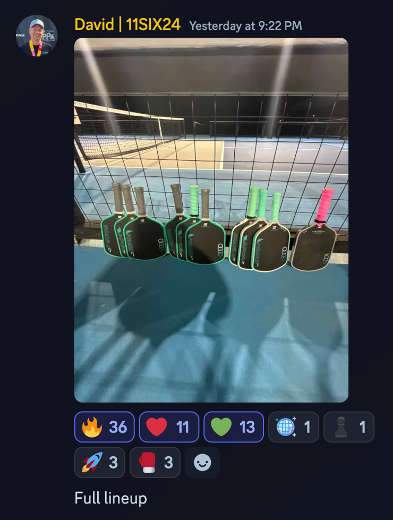Discord post from David at 11SIX24 showing green and black paddles lined along a court fence, captioned full lineup.