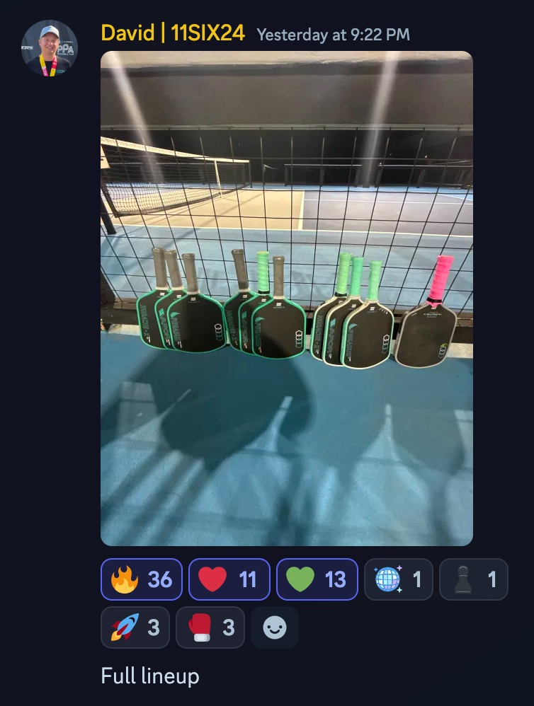 Discord post from David at 11SIX24 showing green and black paddles lined along a court fence, captioned full lineup.