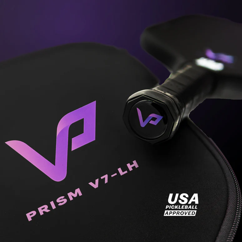 Close-up of a purple Vatic Pro Prism V7-LH paddle, stamped USA Pickleball approved.