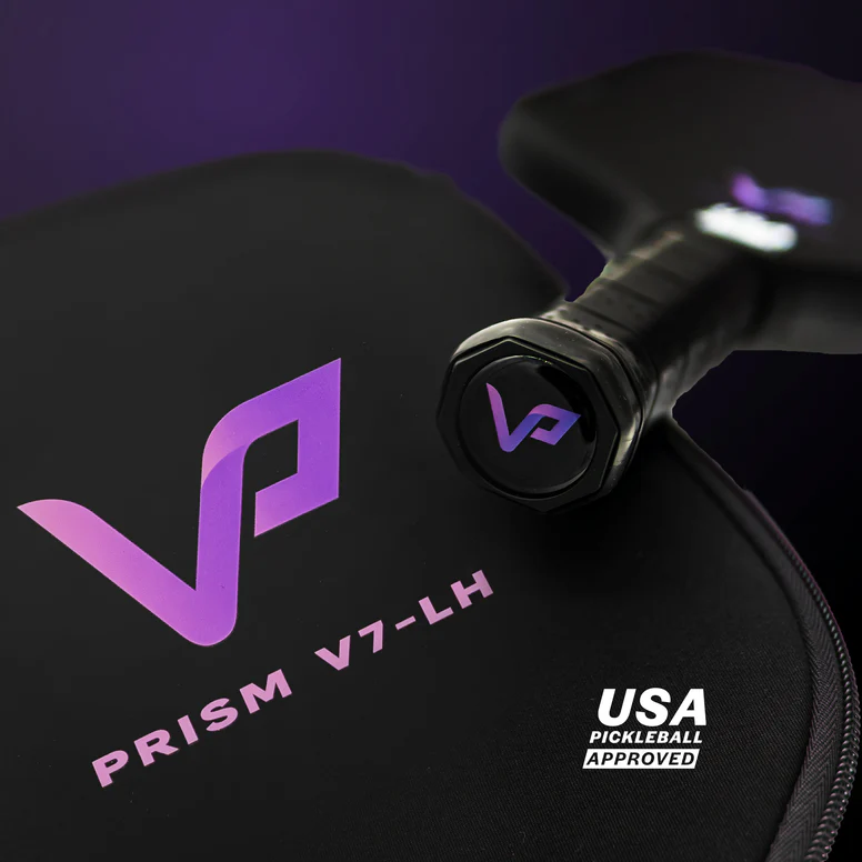 Close-up of a purple Vatic Pro Prism V7-LH paddle, stamped USA Pickleball approved.