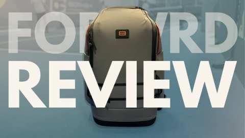 A grey FORWRD backpack-style court caddy photographed indoors, overlaid with the word REVIEW.
