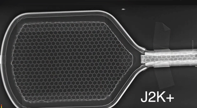 X-ray of a Honolulu J2K+ paddle showing the honeycomb core cells and the internal structure of the handle.