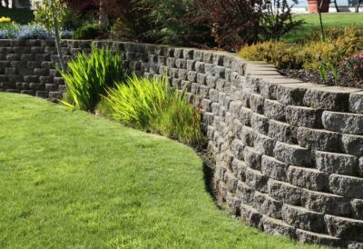 Concrete Block vs Armour Stone Retaining Walls in Red Deer