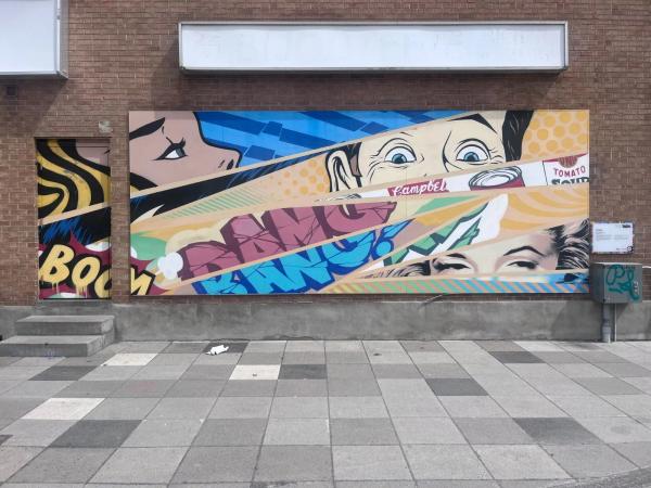 Installation pop art de Marin dans le secteur culturel de Gatineau. Un point fort de la scène de l'art urbain au centre-ville.