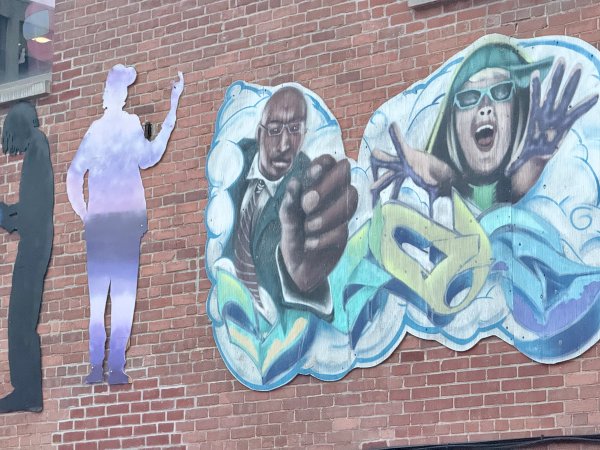 Inconnu street art mural photo 1