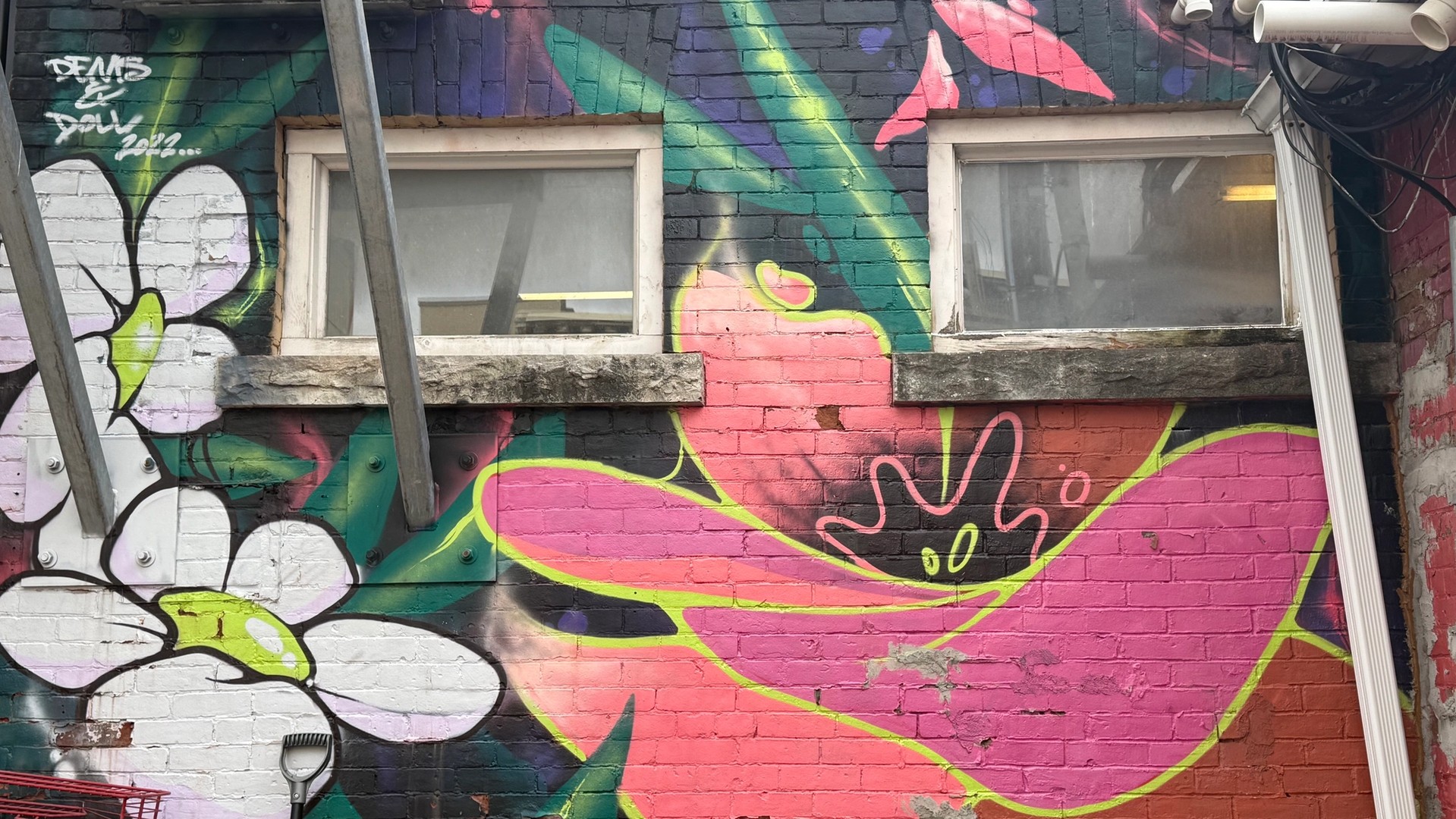 Inconnu mural in Centretown by Dems & Doll