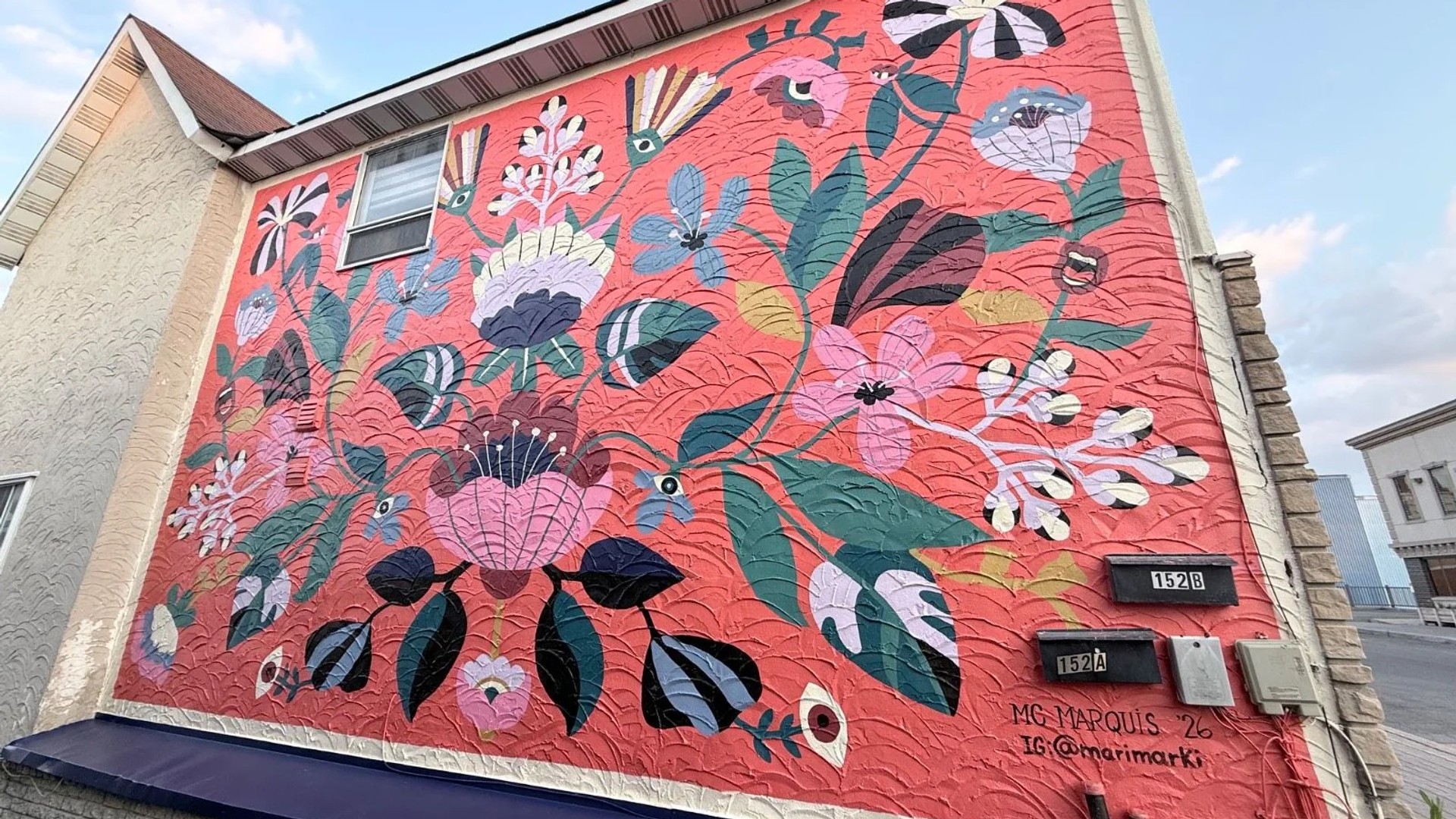 Mural artwork by MC Marquis - Street art in Hull, Ottawa, Ontario