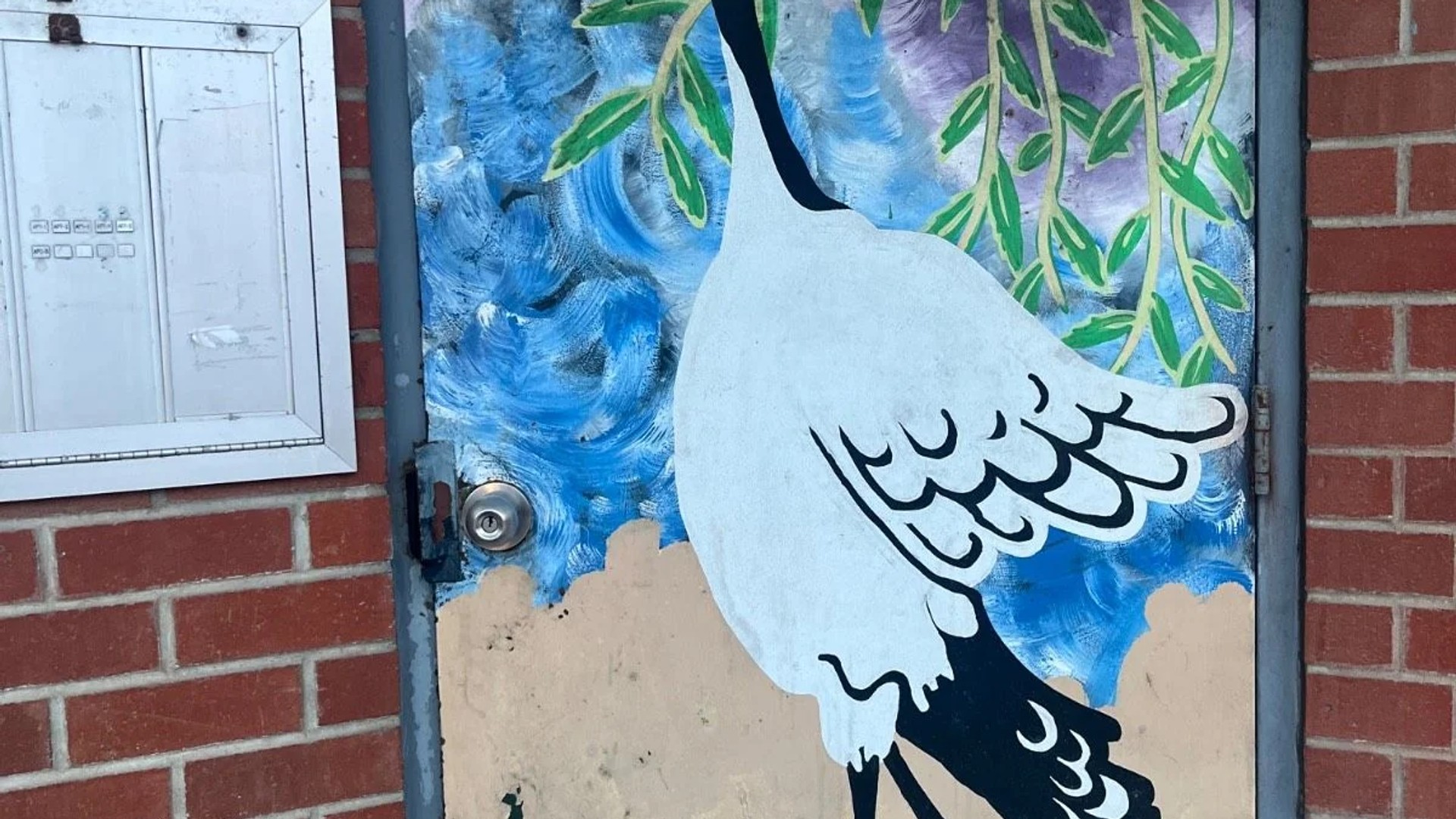 Public mural artwork in Chinatown, Ottawa - Street art scene