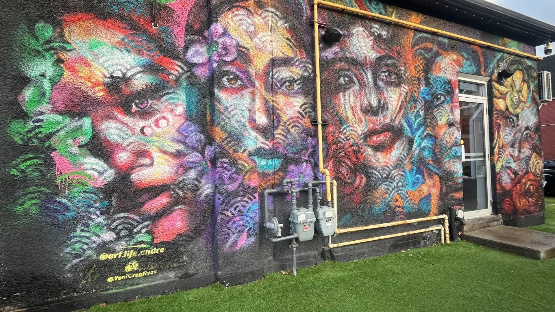 Ottawa street art mural in the Centretown neighborhood, showcasing large-scale figurative and abstract elements.