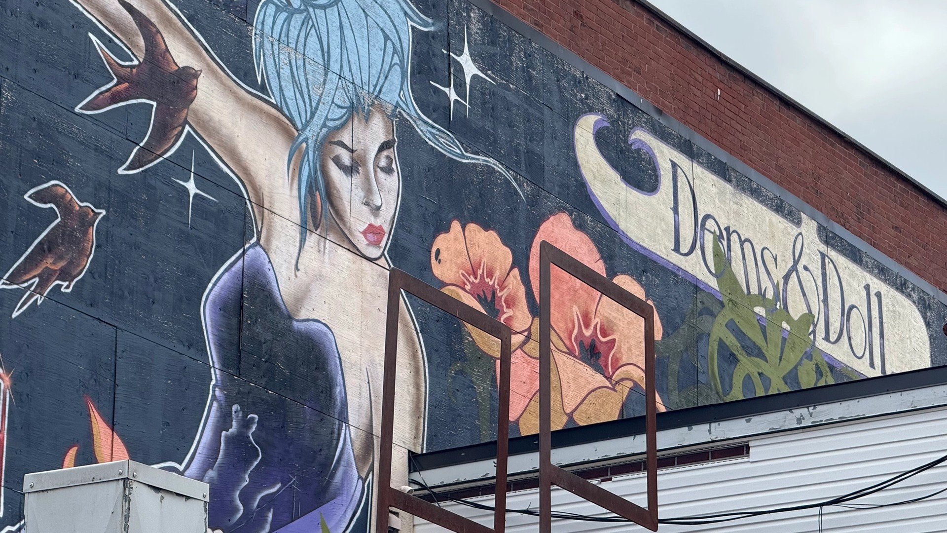 Inconnu mural in Centretown by Dems & Doll