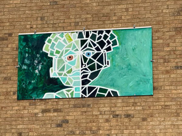 Inconnu street art mural photo 1