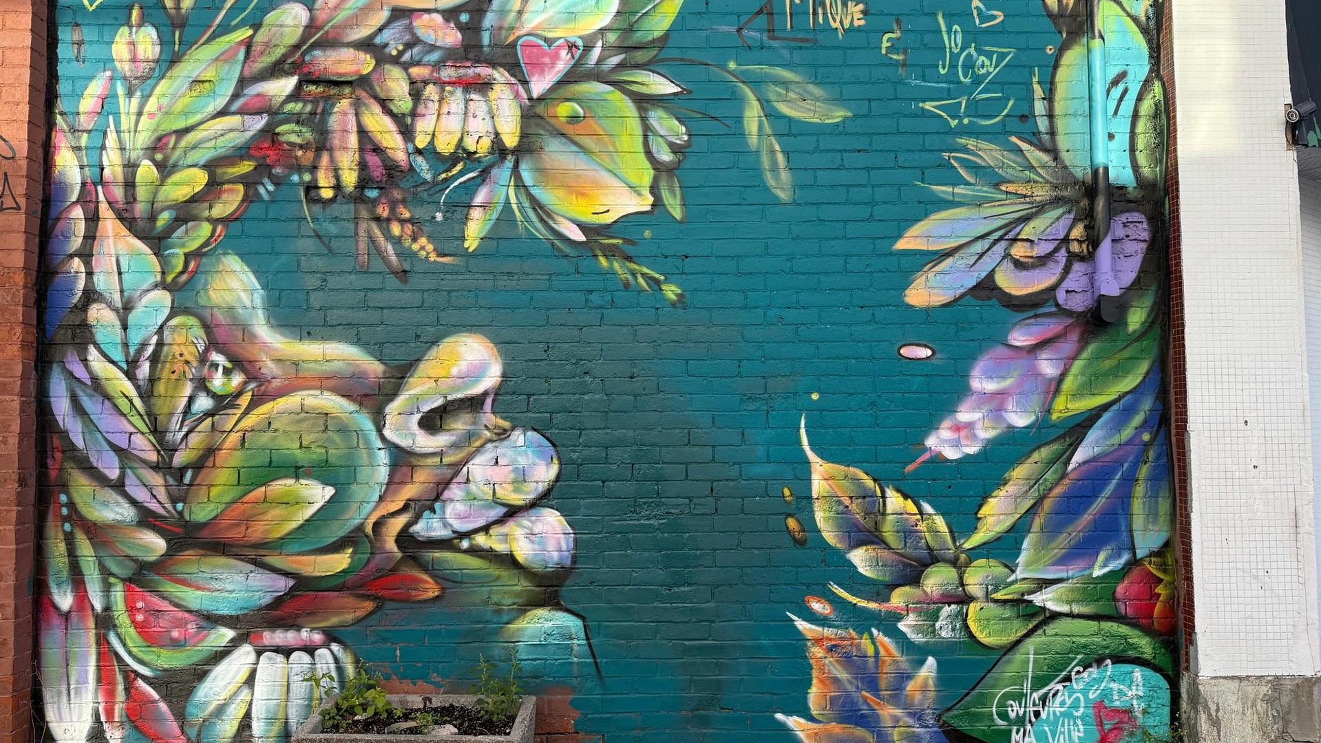 Inconnu mural in Hintonburg by Mique Michelle