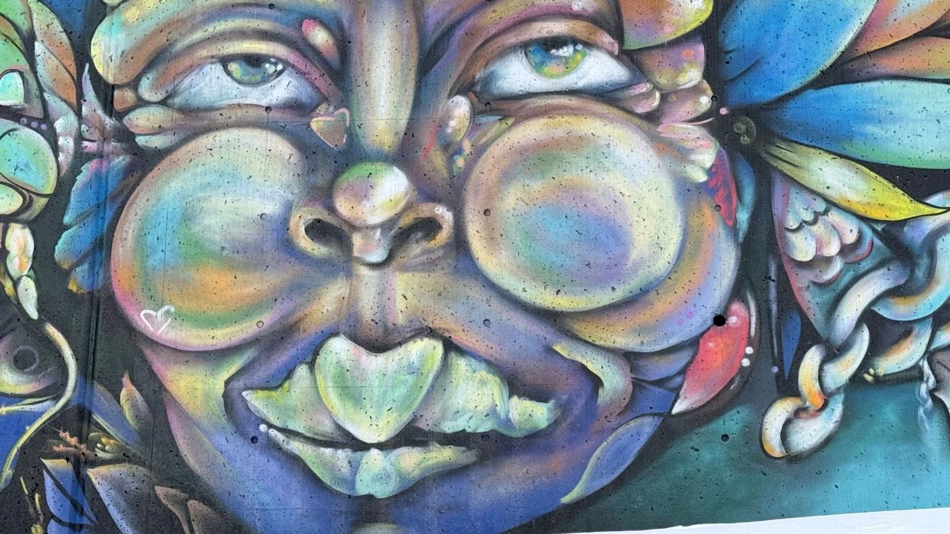 Mural artwork by Mique Michelle - Street art in Byward Market, Ottawa, Ontario