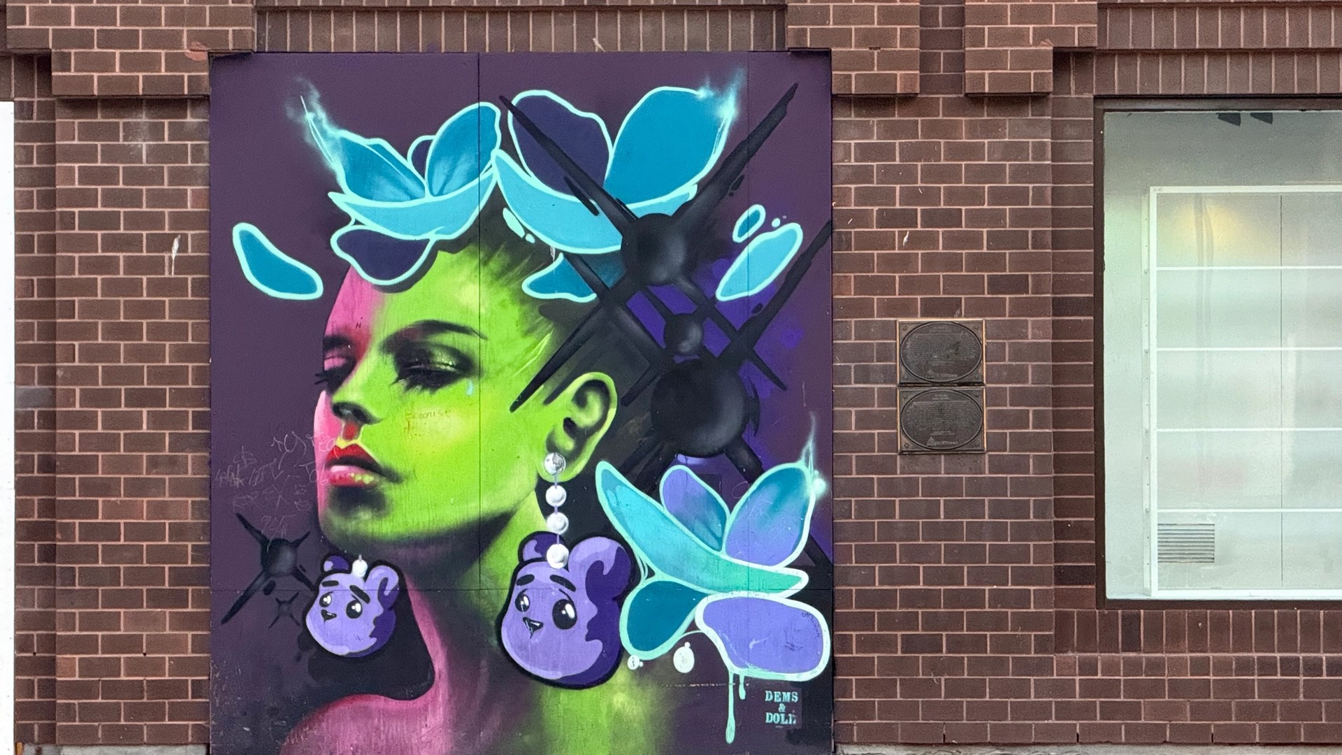 Inconnu mural in Lowertown by Dems & Doll
