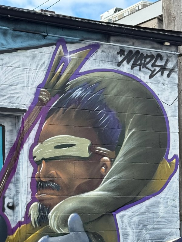 Unknown street art mural photo 1