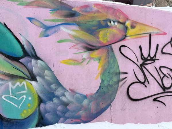 Mural artwork by Mique Michelle - Street art in Byward Market, Ottawa, Ontario