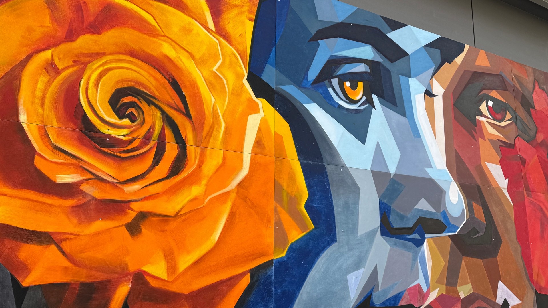 Ottawalls showing spring nature-themed street art mural in the Glebe for the Tulip Festival