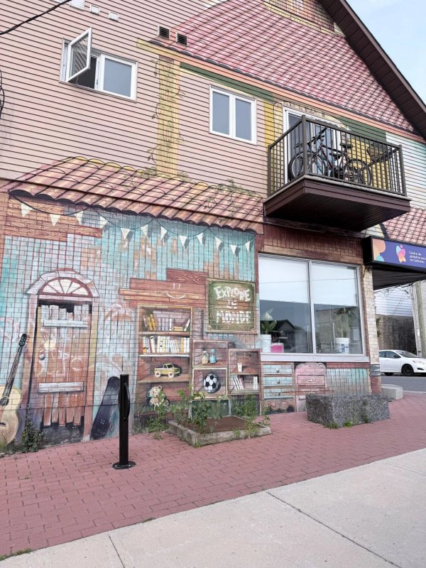 Explore Le Monde - Street art mural in Hull, Ottawa, Ontario