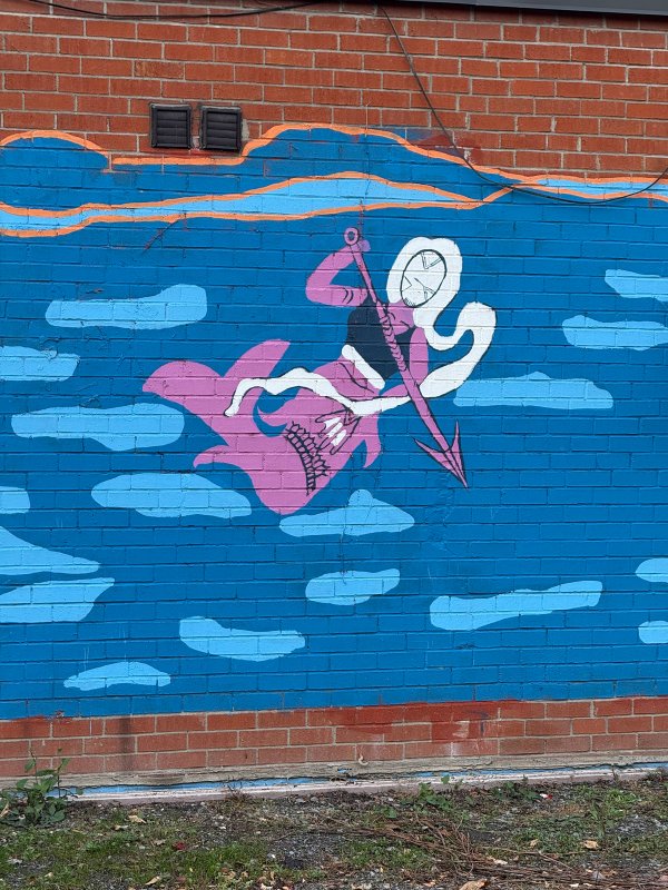 Unknown street art mural photo 2