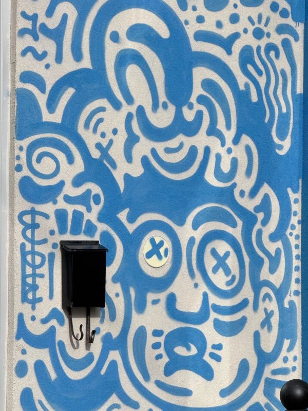 Mural artwork by Jordan Childs - Street art in Chinatown, Ottawa, Ontario