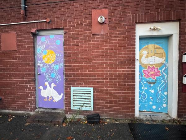 Public art installation in downtown Ottawa (Centretown), a colorful, large-scale mural enriching the urban landscape.