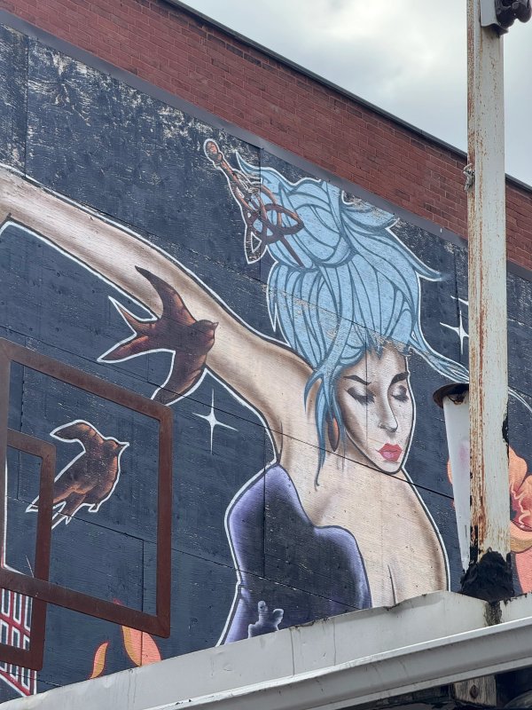 Unknown street art mural photo 1