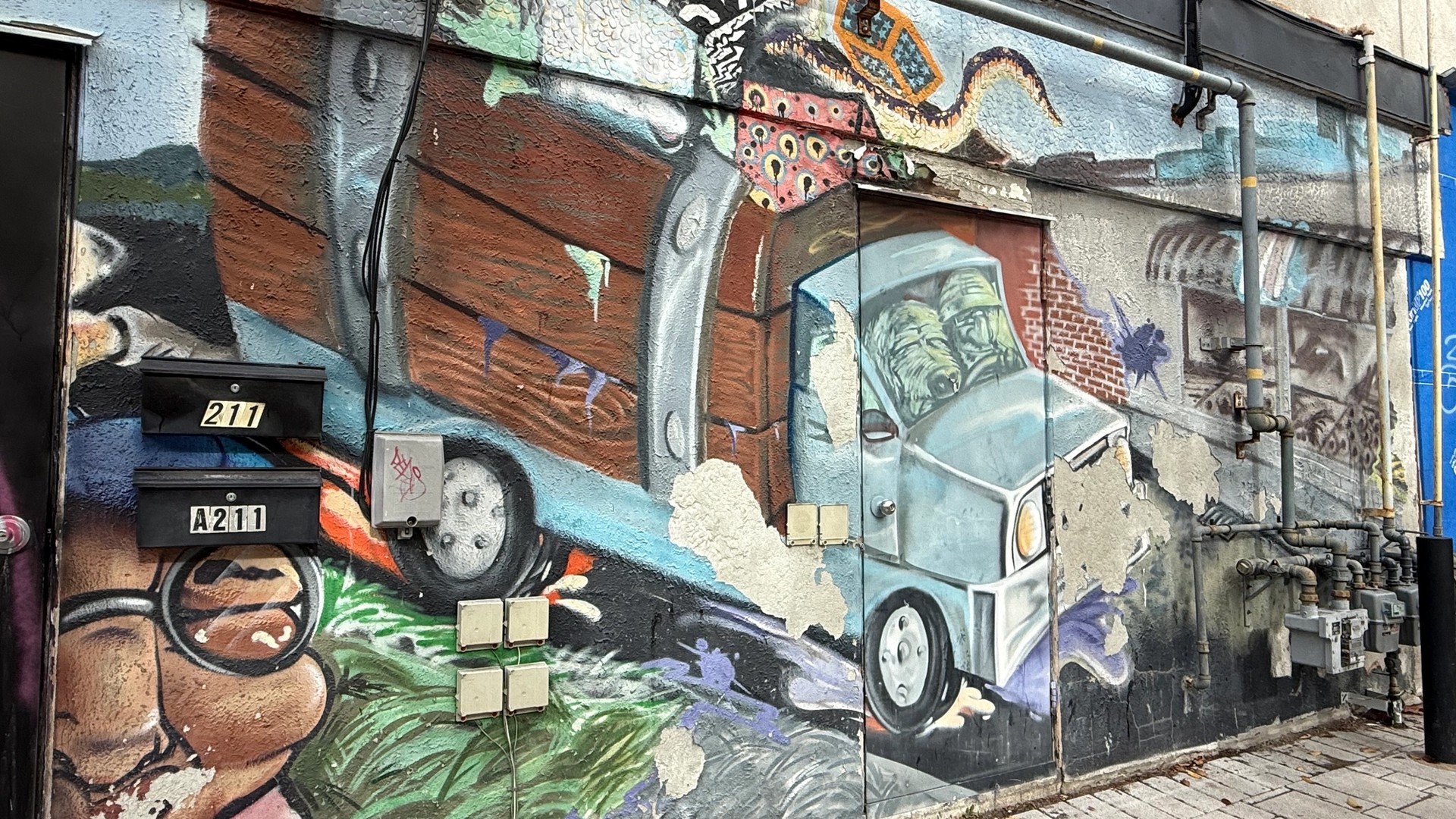 Inconnu mural in Golden Triangle by Cassandra Dickie