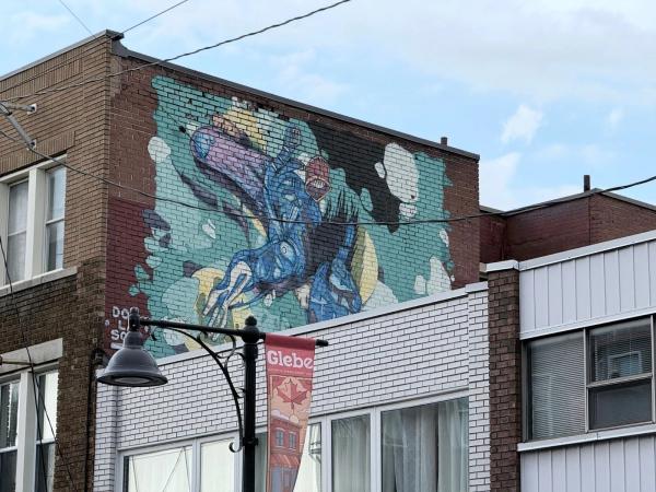 Free Solo by Dom Laporte - Street art mural in The Glebe, Ottawa, Ontario