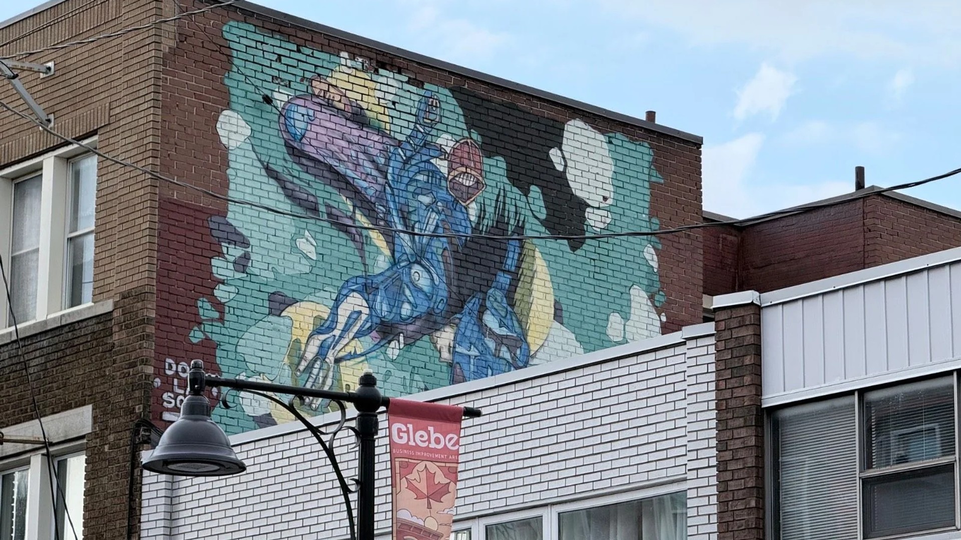 Free Solo by Dom Laporte - Street art mural in The Glebe, Ottawa, Ontario