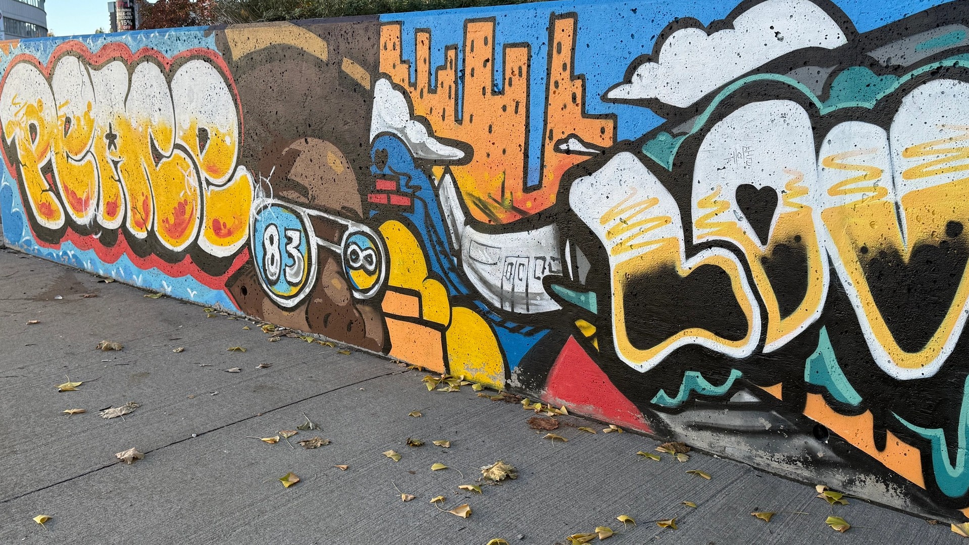 Paix, amour, unité, 83 jusqu'à l'infini mural in Lowertown by Jimmy Baptiste